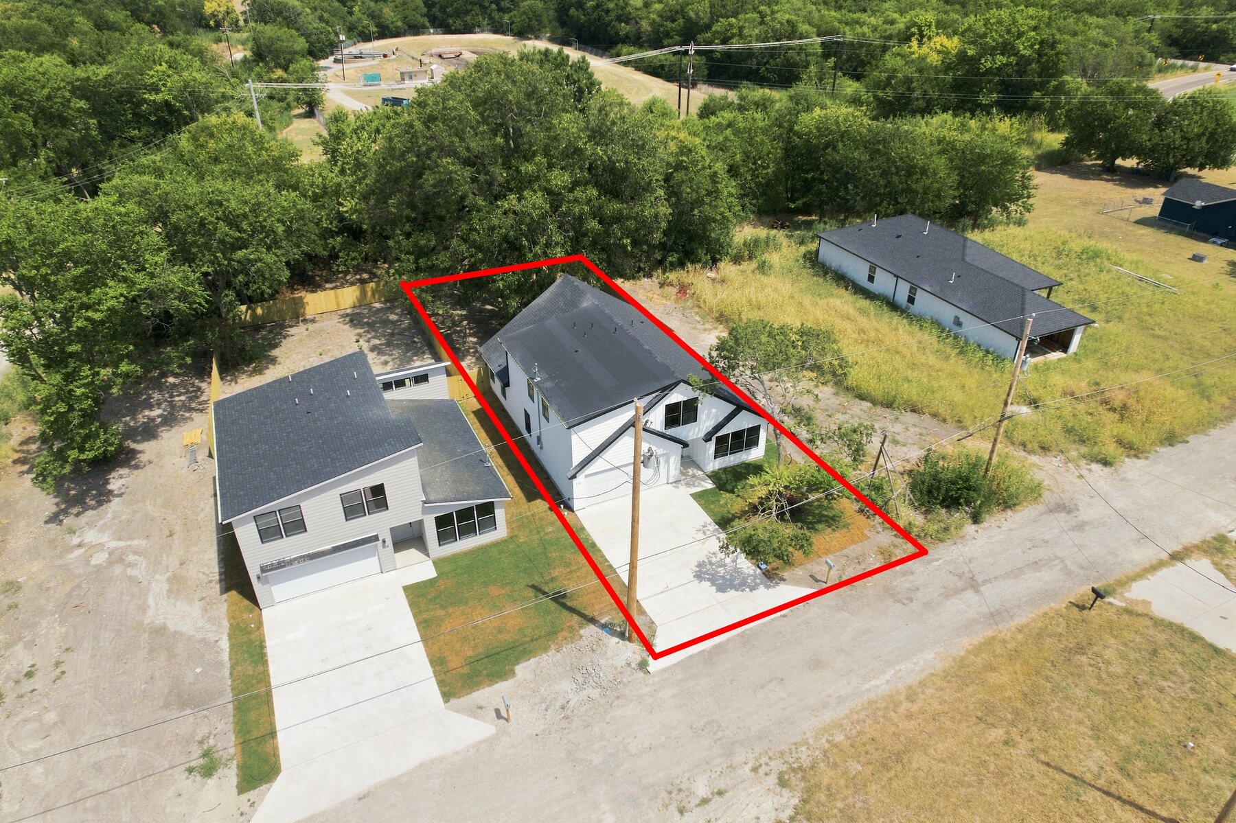 Aerial view of 106 E Miller Street and surrounding neighborhood