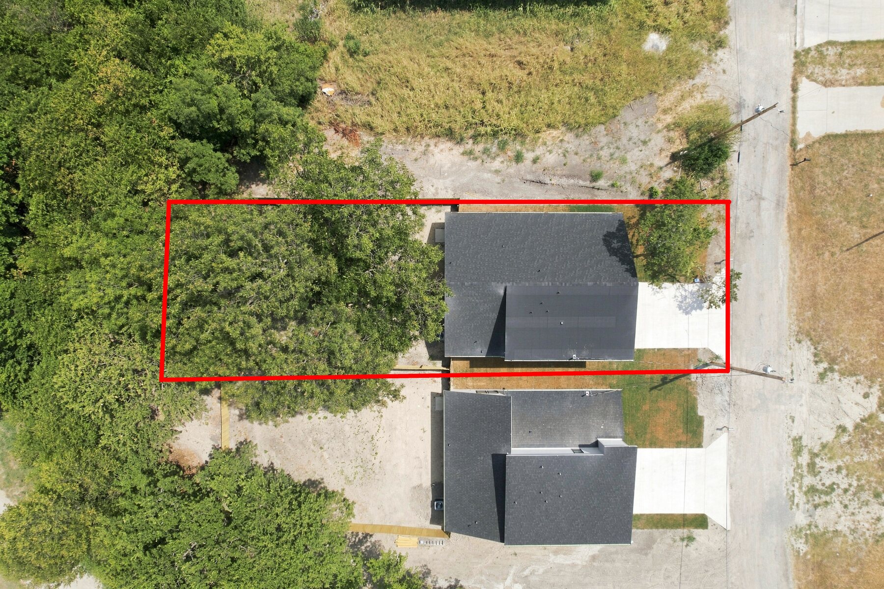 Aerial view of 106 E Miller Street and surrounding neighborhood